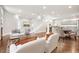 Bright living room featuring hardwood floors, modern furnishings, and an open-concept design at 789 Cooper Sw St, Atlanta, GA 30315