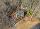 Aerial view of a two-story home surrounded by mature trees at 505 Summer Ter, Woodstock, GA 30189
