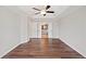 Open bedroom features hardwood floors and entrance to bathroom and large closets at 505 Summer Ter, Woodstock, GA 30189