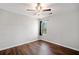 Bedroom with wood floors, neutral walls, and ceiling fan at 505 Summer Ter, Woodstock, GA 30189