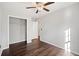 Bedroom featuring hardwood floors, a ceiling fan and closet at 505 Summer Ter, Woodstock, GA 30189