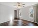 Bedroom with natural light, ceiling fan, and closet at 505 Summer Ter, Woodstock, GA 30189
