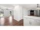 Open kitchen design connects to living spaces, with granite counters, and lots of cabinet space at 505 Summer Ter, Woodstock, GA 30189