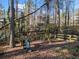 The backyard of this home includes a swing set and playground for to enjoy at 505 Summer Ter, Woodstock, GA 30189