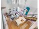 Open-concept living area boasts high ceilings, natural light, modern decor, and seamless flow to the kitchen at 260 18Th Nw St # 10202, Atlanta, GA 30363