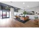 Spacious lobby featuring hardwood floors, contemporary furniture, and modern lighting at 260 18Th Nw St # 10202, Atlanta, GA 30363