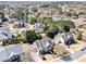 An aerial view of the neighborhood showcases the lush landscaping and well-maintained homes at 404 N Cascades Cir, Canton, GA 30114