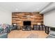 Basement with media center and hardwood accent wall at 404 N Cascades Cir, Canton, GA 30114