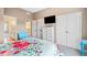 Bedroom featuring large closets, a dresser, and a full bed at 404 N Cascades Cir, Canton, GA 30114
