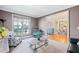 Cozy living room with neutral walls, plush carpet, and ample seating at 404 N Cascades Cir, Canton, GA 30114