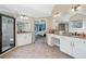 An elegant bathroom with granite countertops, tile flooring, and dual vanity sinks at 404 N Cascades Cir, Canton, GA 30114