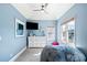 A main bedroom features blue walls, ceiling fan, and a large bean bag chair at 404 N Cascades Cir, Canton, GA 30114