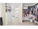 Spacious walk-in closet with custom built-in shelving and plenty of room for organizing clothing and accessories at 404 N Cascades Cir, Canton, GA 30114