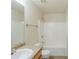 Standard bathroom with a tub/shower combo, vanity, and updated fixtures at 445 Skif Pond Ct, Atlanta, GA 30349