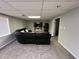 Basement featuring a leather sectional sofa and mounted television at 4960 Trevino Cir, Duluth, GA 30096