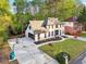 Two-story home featuring great landscaping, an attached garage, and a basketball hoop at 4960 Trevino Cir, Duluth, GA 30096