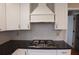 Updated kitchen with new countertops, updated appliances, and hexagon tile backsplash at 4960 Trevino Cir, Duluth, GA 30096