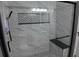 Walk in shower with sleek white tile and modern fixtures at 4960 Trevino Cir, Duluth, GA 30096
