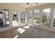 Bright sunroom with multiple windows offering natural light and scenic views, perfect for relaxation and enjoyment at 4960 Trevino Cir, Duluth, GA 30096