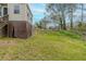 Large grassy backyard surrounded by trees at 202 Nathan Sw Rd, Atlanta, GA 30331