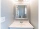 Bathroom featuring a vanity and a mirror at 202 Nathan Sw Rd, Atlanta, GA 30331