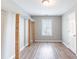 Bedroom featuring wood-look floors and wire shelving at 202 Nathan Sw Rd, Atlanta, GA 30331