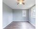 This bedroom features gray walls and wood-look floors at 202 Nathan Sw Rd, Atlanta, GA 30331