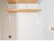 Simple utility closet with shelves perfect for extra storage space at 202 Nathan Sw Rd, Atlanta, GA 30331