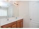 Bathroom featuring a double sink vanity and a large mirror at 2453 Suwanee Pointe Dr, Lawrenceville, GA 30043