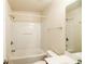 Bathroom featuring a bathtub and shower combo with a single sink vanity at 2453 Suwanee Pointe Dr, Lawrenceville, GA 30043