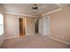 Spacious bedroom with neutral walls, carpet, and ceiling fan at 2453 Suwanee Pointe Dr, Lawrenceville, GA 30043