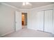 Bright bedroom with neutral walls and trim plus a large closet and ensuite bathroom at 2453 Suwanee Pointe Dr, Lawrenceville, GA 30043
