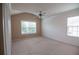 Bedroom with high ceiling, ceiling fan, and good natural light at 2453 Suwanee Pointe Dr, Lawrenceville, GA 30043