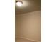 Neutral wall with trim on carpeted floor at 2453 Suwanee Pointe Dr, Lawrenceville, GA 30043