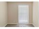 Cozy bedroom featuring carpet and a window letting in plenty of natural light at 2973 Cambridge Sw Dr, Atlanta, GA 30331