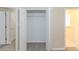 Spacious walk-in closet adjacent to bedroom, and carpet flooring at 2973 Cambridge Sw Dr, Atlanta, GA 30331
