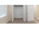 Carpeted bedroom with closet at 2973 Cambridge Sw Dr, Atlanta, GA 30331