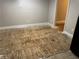 This room shows the bare wood floor at 8229 Queens Dr, Jonesboro, GA 30238