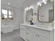 This bathroom has double sinks, chrome fixtures, a soaking tub, and large vanity at 830 Gaston Street Sw, Atlanta, GA 30310