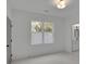 Bedroom with natural light from a window, painted gray doors, and a neutral color palette at 830 Gaston Street Sw, Atlanta, GA 30310