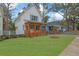 Charming two-story home with a well-manicured lawn and inviting wooden porch at 830 Gaston Street Sw, Atlanta, GA 30310