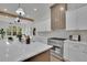 Gourmet kitchen with quartz countertops, gas range, stainless appliances, and a large island with seating at 830 Gaston Street Sw, Atlanta, GA 30310