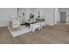 Living room with modern furniture and decor, open layout, and light wood flooring at 830 Gaston Street Sw, Atlanta, GA 30310