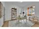 Bright office space with a white desk, light colored chair, hardwood floors, and lots of light at 830 Gaston Street Sw, Atlanta, GA 30310