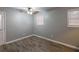 Comfortable bedroom with neutral walls, ceiling fan, and ample natural light at 3564 Sage Dr, Lithia Springs, GA 30122