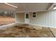 Covered carport area with a door to the house and a window at 3564 Sage Dr, Lithia Springs, GA 30122