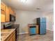Bright kitchen with stainless steel appliances and tiled backsplash at 3564 Sage Dr, Lithia Springs, GA 30122