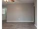 Spacious living room with wood-look flooring and neutral color palette at 3564 Sage Dr, Lithia Springs, GA 30122