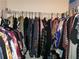 Organized closet showcasing a variety of clothing neatly arranged on hangers at 6051 Wintergreen Rd, Norcross, GA 30093