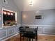 Cozy dining room with a view of the adjacent kitchen at 6051 Wintergreen Rd, Norcross, GA 30093